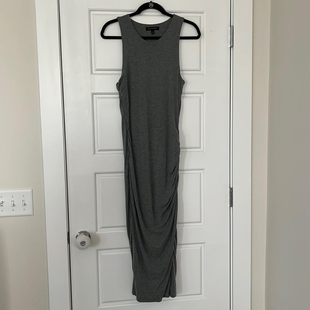 Dress, grey jersey material, long fitted, ruched side detail.